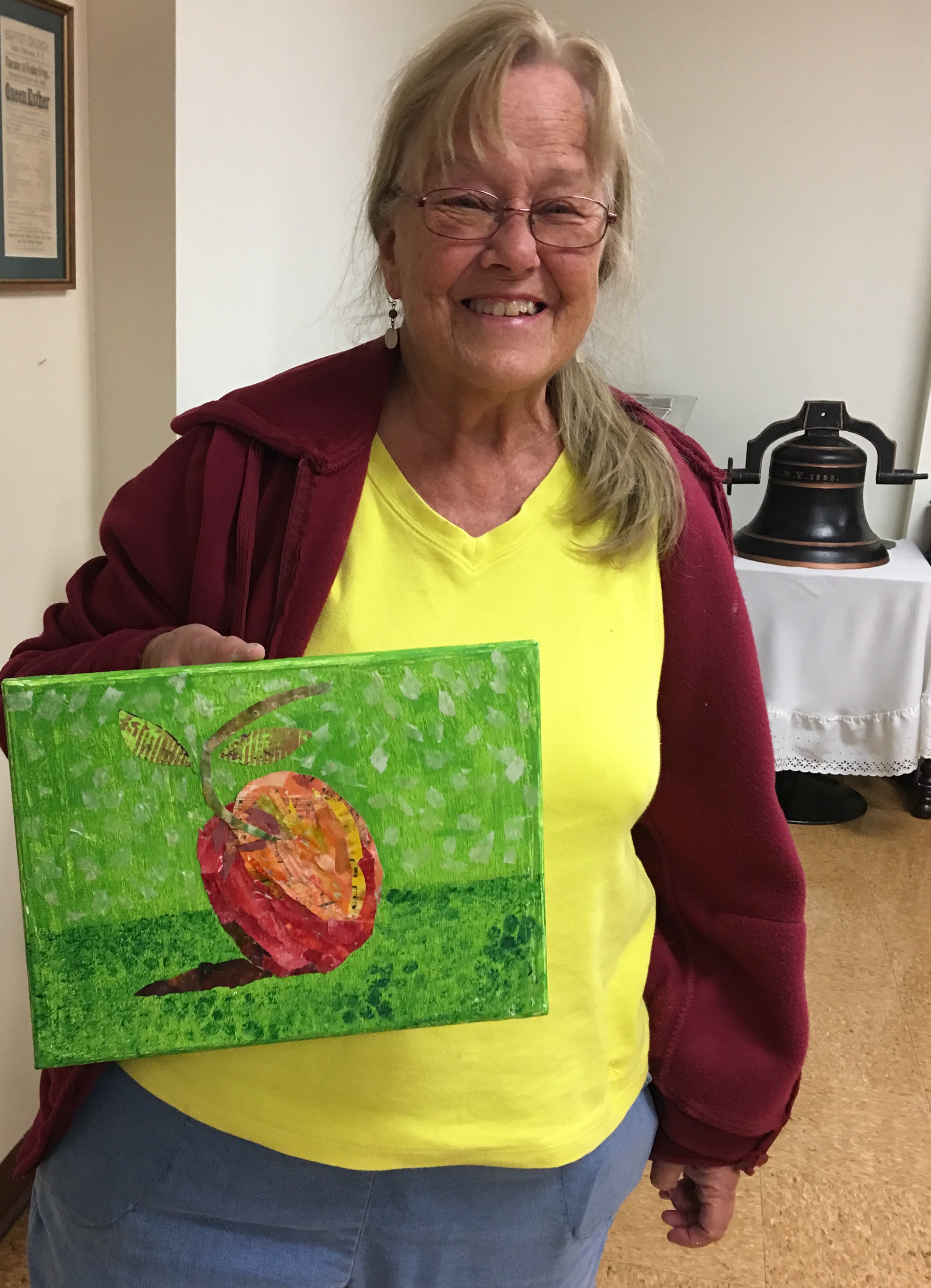 Pat showing her mixed media Apple made with a gelli plate